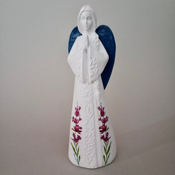 Figura padre nuestro azul oscuro
